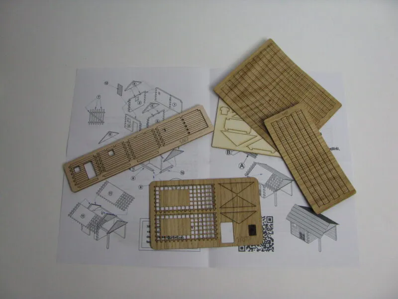 Kozí chliev a drevník